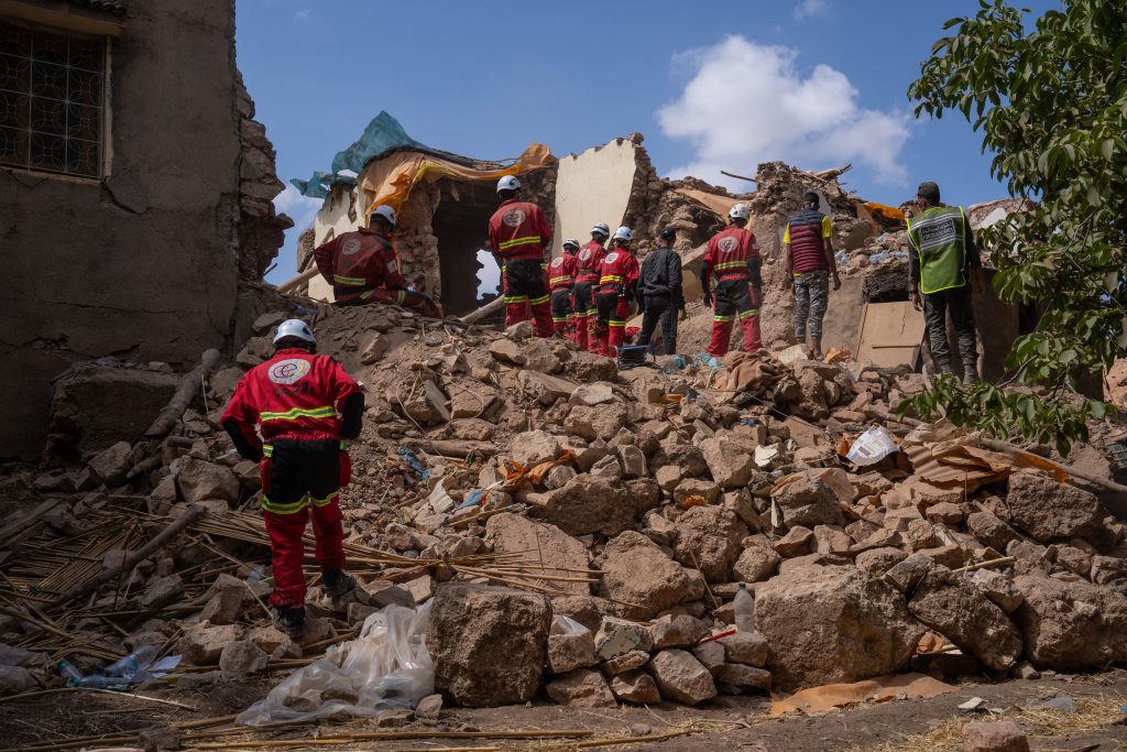 ANOUGAL, MOROCCO - SEPTEMBER 12: A Spanish search and rescue team look for bodies beneath a collapsed building on September 12, 2023 in Anougal, Morocco. Almost 3000 people are now believed to be dead following the large earthquake that struck below villages in the High Atlas mountains around 70km south of Marrakesh. (Photo by Carl Court/Getty Images)