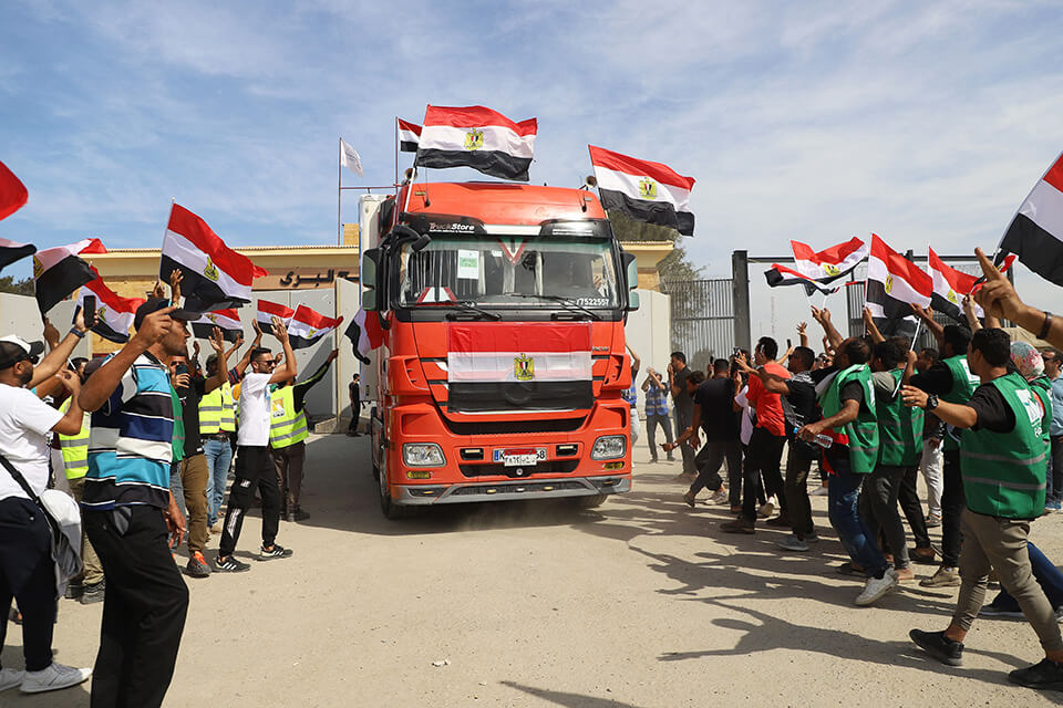 A truck crosses back into Egypt after dropping aid into Gaza
