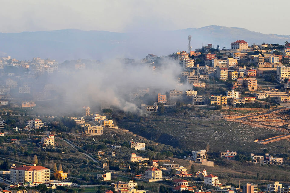Smoke rises from a village in Lebanon