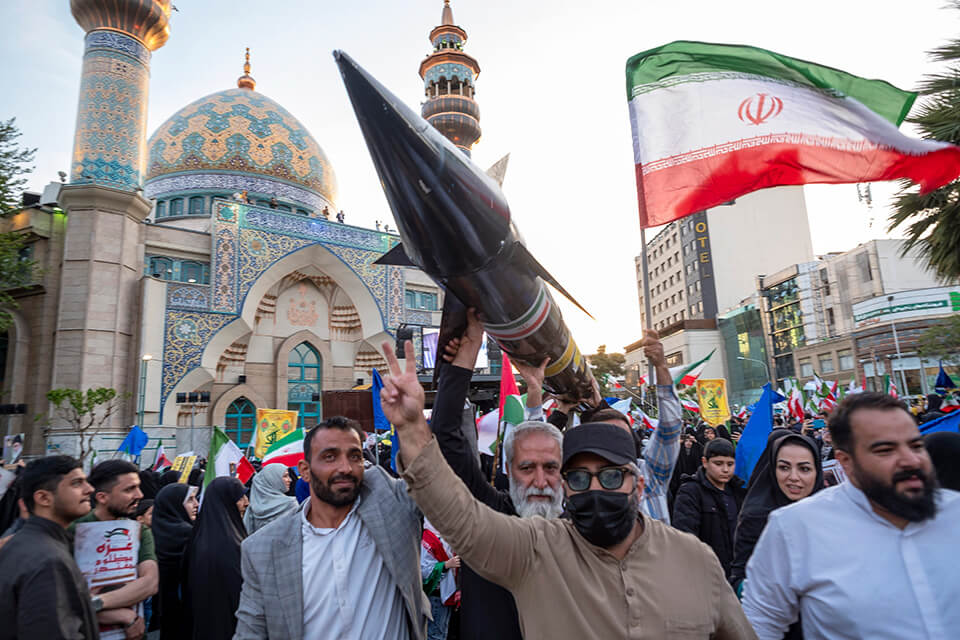 Iranians show their support for the attack